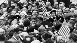 28th June 1963:  President John F Kennedy of the USA is almost lost among a crowd of well-wishers during his visit to Cork in Ireland.  (Photo by Keystone/Getty Images)