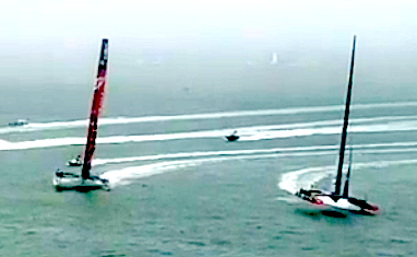 Held on the sea by the physics that I don't properly understand: Oracle Team USA and Emirates Team New Zealand racing in San Francisco today. Wow.